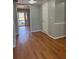 Entryway featuring hardwood floors, neutral paint and white door at 866 Indian Lake Nw Dr, Lilburn, GA 30047