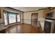 Kitchen dining area with hardwood floors and large bay window at 2539 Britt Rd, Snellville, GA 30078