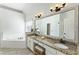 Spa-like bathroom with double vanity, granite counters, soaking tub, and separate shower at 3825 Bishops Walk, Cumming, GA 30041