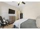 This modern bedroom features a comfortable bed, sleek furniture, and ample natural light at 3825 Bishops Walk, Cumming, GA 30041