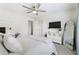Cozy bedroom with neutral colors, a ceiling fan, and ample space for relaxation at 3825 Bishops Walk, Cumming, GA 30041