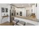 Charming kitchen offers stainless steel appliances, granite countertops, and a convenient wine rack at 3825 Bishops Walk, Cumming, GA 30041