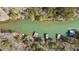 Aerial view of a waterfront with multiple boat docks at 3825 Bishops Walk, Cumming, GA 30041