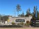 The brick Meadows at Bay Creek community welcome sign at 4161 Dean Grove Way, Loganville, GA 30052