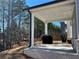 Covered patio provides ample space for outdoor gatherings and relaxation at 4161 Dean Grove Way, Loganville, GA 30052
