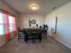 Cozy dining room with modern table, chairs, and stylish window treatments at 4161 Dean Grove Way, Loganville, GA 30052