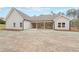 This home has a spacious backyard, a covered patio and ample opportunities to relax outside at 46 Lexie Ct, Rockmart, GA 30153