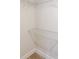Cozy closet with white wire shelving for storage, carpet and white trim at 46 Lexie Ct, Rockmart, GA 30153
