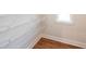 Modern closet featuring white wire shelving, and vinyl flooring at 46 Lexie Ct, Rockmart, GA 30153