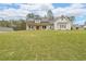 Charming two-story house with a spacious lawn and a blend of traditional and modern design elements at 46 Lexie Ct, Rockmart, GA 30153