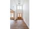 Grand foyer with high ceilings, hardwood floors, and a stylish light fixture at 46 Lexie Ct, Rockmart, GA 30153
