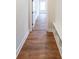 Hallway with a built-in bench and coat rack with Luxury Vinyl Plank flooring at 46 Lexie Ct, Rockmart, GA 30153