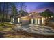 Cozy backyard patio with stone pavers and outdoor seating, providing a tranquil space for relaxation at 759 Reeves Lake Sw Dr, Marietta, GA 30064