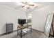 Home office in bedroom; features modern desk and chair, a neutral color scheme, and a window view at 759 Reeves Lake Sw Dr, Marietta, GA 30064