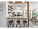 Eat-in kitchen with granite countertops, stainless appliances, and barstool seating at 759 Reeves Lake Sw Dr, Marietta, GA 30064