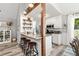 Charming kitchen boasts granite countertops, stainless steel appliances, and stylish barstool seating at 759 Reeves Lake Sw Dr, Marietta, GA 30064