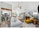 Open-concept living room with a view into the kitchen, lots of light and hardwood floors at 759 Reeves Lake Sw Dr, Marietta, GA 30064