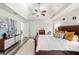 Large main bedroom with tray ceilings, neutral paint, and ample natural light at 759 Reeves Lake Sw Dr, Marietta, GA 30064