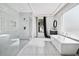 Bathroom featuring walk-in shower and free standing tub at 412 Ashwood Sw Ave, Atlanta, GA 30315