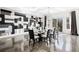 Dining area with modern table, chairs, and accent wall at 412 Ashwood Sw Ave, Atlanta, GA 30315