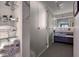 Bathroom with modern glass shower, built-in storage shelves and updated fixtures at 75 14Th St # 4140, Atlanta, GA 30309