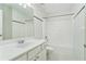 Bright bathroom featuring vanity with cabinets, a mirror, toilet, and shower at 885 Clairidge Ln, Lawrenceville, GA 30046