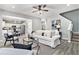 Inviting living room with an open concept, hardwood floors, and neutral colors at 885 Clairidge Ln, Lawrenceville, GA 30046