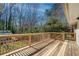 Spacious wooden deck with railing, perfect for outdoor entertaining and enjoying the natural surroundings at 1131 Mayfield Dr, Decatur, GA 30033