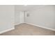 Comfortable bedroom with neutral carpet, a window, and a closet door at 1131 Mayfield Dr, Decatur, GA 30033