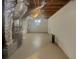 Unfinished basement perfect for storage or workshop, featuring visible ductwork and utility systems at 2217 Troutdale Dr, Decatur, GA 30032