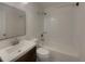 Clean, white bathroom with modern fixtures and a shower-tub combination at 2217 Troutdale Dr, Decatur, GA 30032