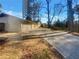 Large driveway leading to a two-car garage, set back from the main house at 2217 Troutdale Dr, Decatur, GA 30032