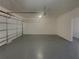 Spacious two-car garage with ample room for storage and parking, freshly painted walls, and epoxy floors at 2217 Troutdale Dr, Decatur, GA 30032