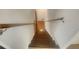 Wooden staircase with railing, leading to another floor of the home at 2217 Troutdale Dr, Decatur, GA 30032