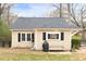 Charming home exterior with black shutters and well-maintained landscaping at 4101 Morgan Rd, Tucker, GA 30084