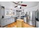 Bright kitchen featuring stainless appliances, granite countertops, and overhead cabinets at 4101 Morgan Rd, Tucker, GA 30084