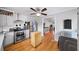 Kitchen featuring stainless appliances, ample counter space, and convenient laundry area at 4101 Morgan Rd, Tucker, GA 30084