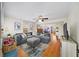 Comfortable living room featuring an expansive sofa, hardwood floors, and inviting decor at 4101 Morgan Rd, Tucker, GA 30084
