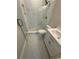 This bathroom features a new vanity, toilet, and tiled stand-up shower at 731 Hanover Se Ln, Marietta, GA 30067