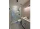 Renovated bathroom with glass-enclosed shower and modern vanity at 731 Hanover Se Ln, Marietta, GA 30067