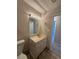 Bathroom featuring tiled floors, and vanity with an adjacent toilet at 731 Hanover Se Ln, Marietta, GA 30067