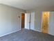 Bedroom boasts carpeted floors, neutral walls, and doorway access to a bathroom at 731 Hanover Se Ln, Marietta, GA 30067