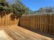 View of the private wooden deck with privacy fence at 731 Hanover Se Ln, Marietta, GA 30067