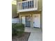 Home entrance featuring a white door, sliding glass door and green bushes at 731 Hanover Se Ln, Marietta, GA 30067