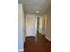 Hallway with tile floors leading to a stairway at 731 Hanover Se Ln, Marietta, GA 30067