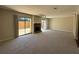 Spacious living room featuring a fireplace and sliding glass door at 731 Hanover Se Ln, Marietta, GA 30067