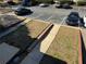 View of the parking lot adjacent to green spaces at 731 Hanover Se Ln, Marietta, GA 30067