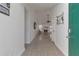 Bright foyer with tile flooring leading to the living area with fireplace, creating an inviting entrance at 1025 Grace Dr, Lawrenceville, GA 30043