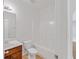 Bathroom with shower-tub combo, neutral flooring, vanity and sink at 1765 Stone Meadow Rd, Lithonia, GA 30058