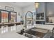 Close-up of kitchen island with stainless steel sink and views of the backyard at 2755 Turning Leaf Dr, Lawrenceville, GA 30044